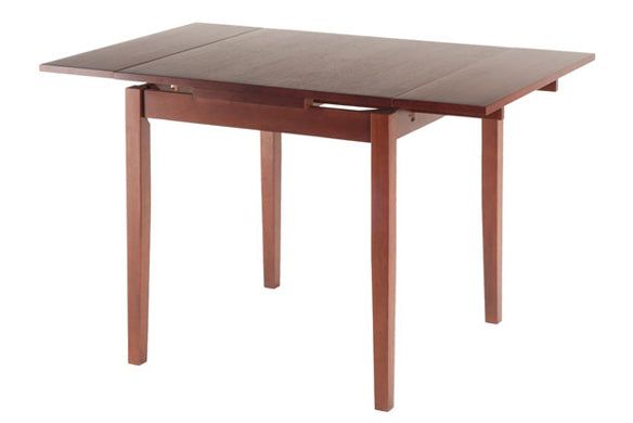 La petite solid wood table extended